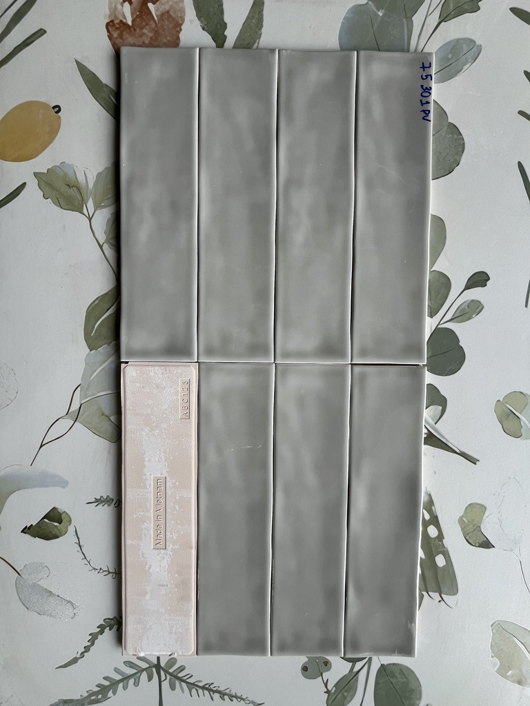 Gạch thẻ xám bóng lượn 75x300mm FA0312PV2